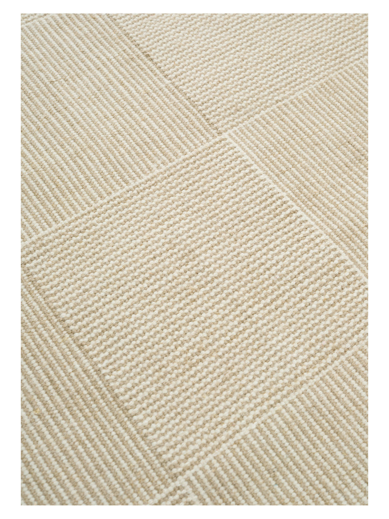 Chess White hand-woven rug – close-up of the texture | Linie Design at Bois Blanc Home, Limassol, Cyprus