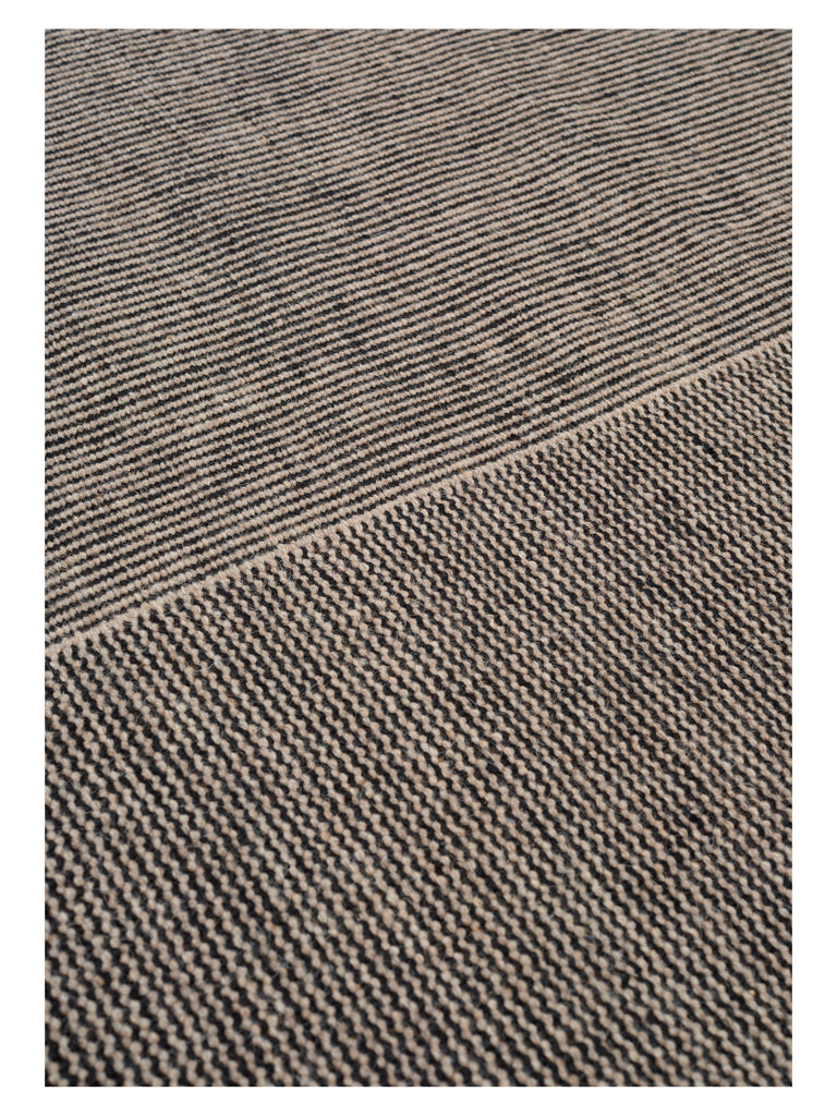 Kent Stone hand-woven rug – close-up of the texture | Linie Design at Bois Blanc Home, Limassol, Cyprus