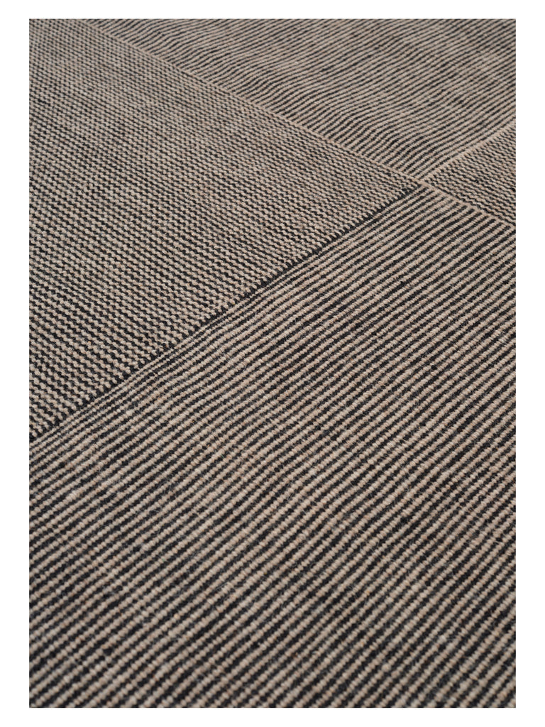 Kent Stone hand-woven rug – close-up of the texture | Linie Design at Bois Blanc Home, Limassol, Cyprus