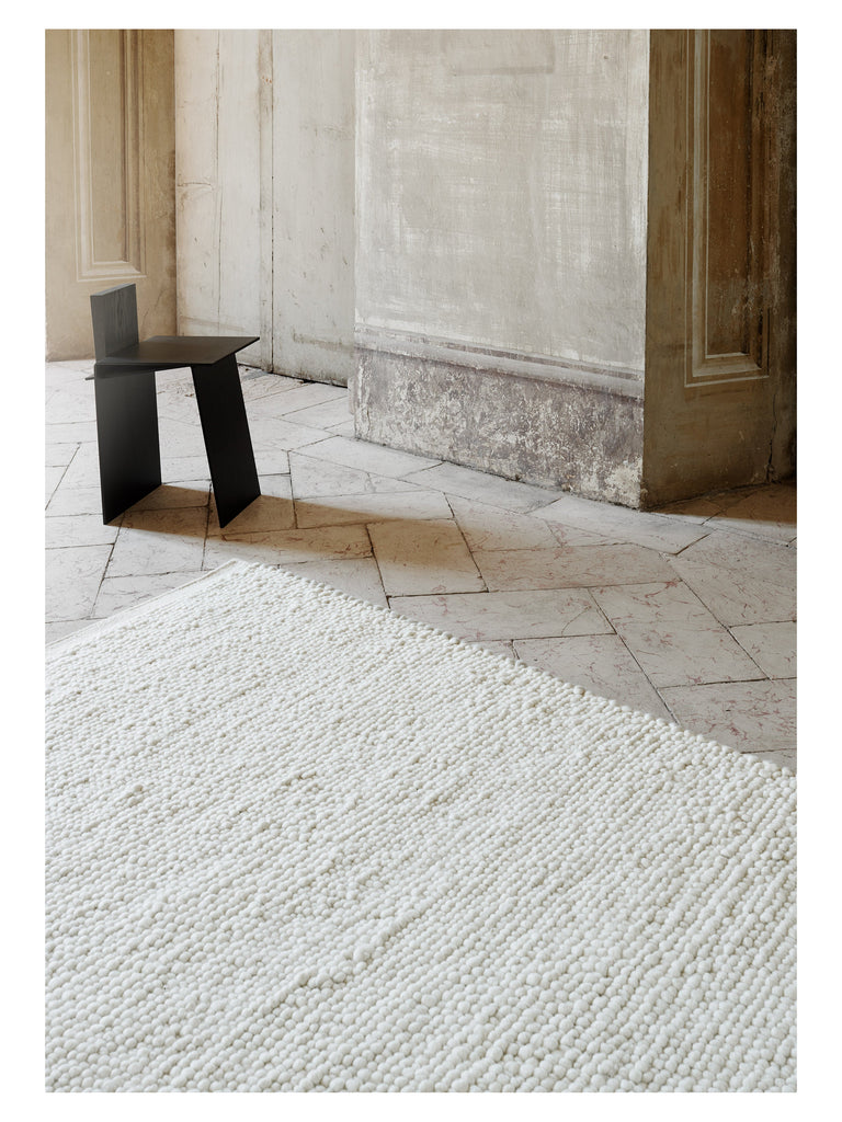 Flavia White hand-woven rug – styled in a living room | Linie Design at Bois Blanc Home, Limassol, Cyprus