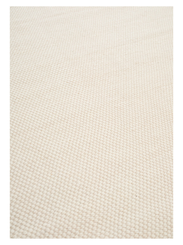 Asko White hand-woven rug – close-up of the texture | Linie Design at Bois Blanc Home, Limassol, Cyprus