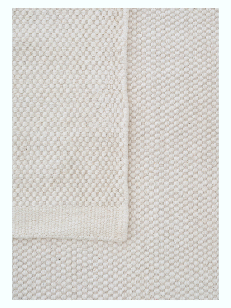 Asko White hand-woven rug – close-up of the texture | Linie Design at Bois Blanc Home, Limassol, Cyprus