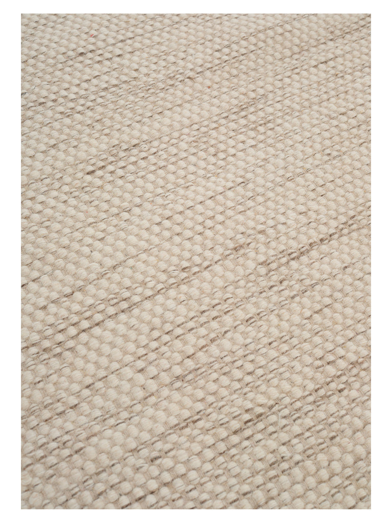 Asko Offwhite hand-woven rug – close-up of the texture | Linie Design at Bois Blanc Home, Limassol, Cyprus