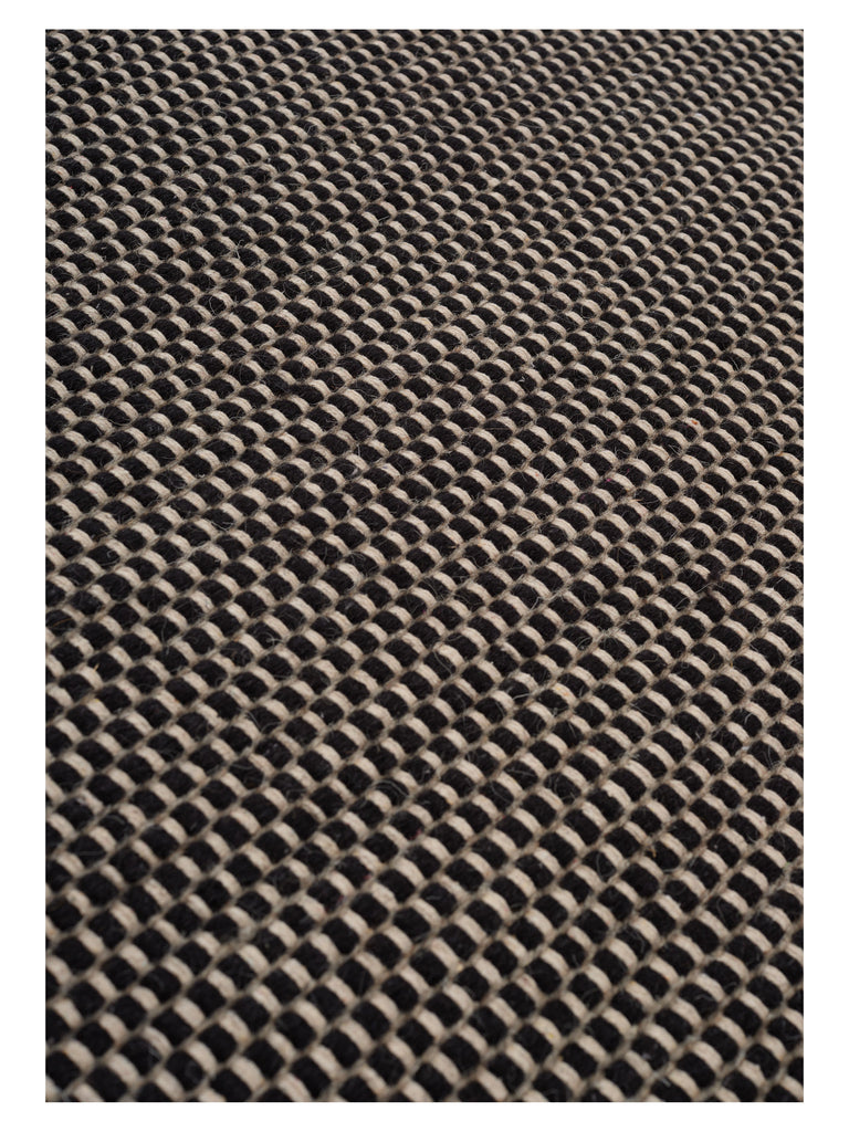 Asko Black hand-woven rug – close-up of the texture | Linie Design at Bois Blanc Home, Limassol, Cyprus