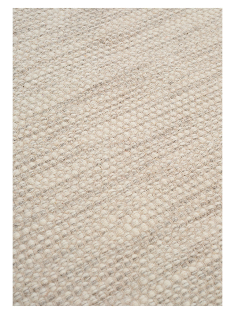 Asko Iron hand-woven rug – close-up of the texture | Linie Design at Bois Blanc Home, Limassol, Cyprus