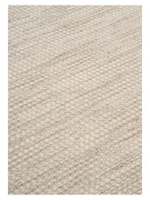 Laden Sie das Bild in den Galerie-Viewer, Asko Iron hand-woven rug – close-up of the texture | Linie Design at Bois Blanc Home, Limassol, Cyprus