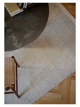 Laden Sie das Bild in den Galerie-Viewer, Frode Marble hand-woven rug – styled in a living room | Linie Design at Bois Blanc Home, Limassol, Cyprus