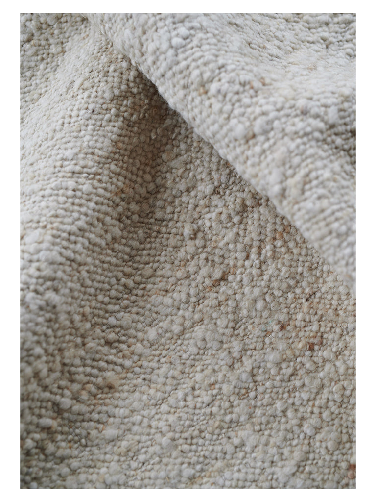 Logmar Ivory hand-woven rug – close-up of the texture | Linie Design at Bois Blanc Home, Limassol, Cyprus