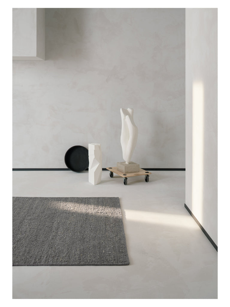 Logmar Stone hand-woven rug – styled in a living room | Linie Design at Bois Blanc Home, Limassol, Cyprus