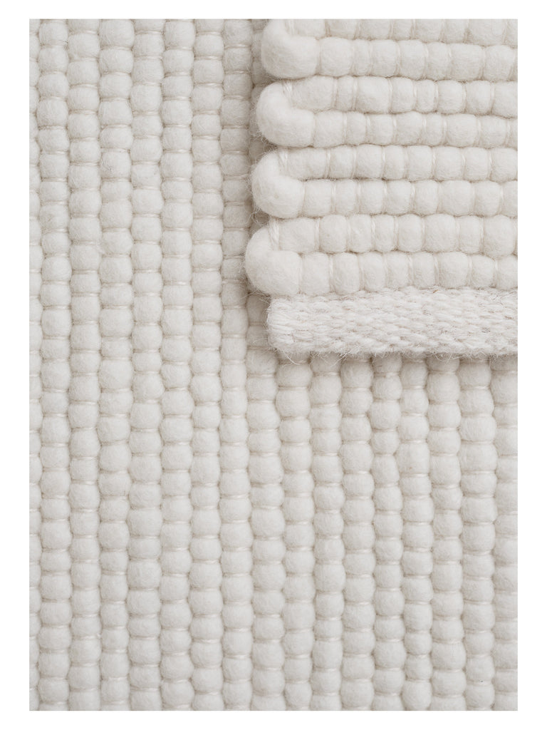 Agner White hand-woven rug – close-up of the texture | Linie Design at Bois Blanc Home, Limassol, Cyprus