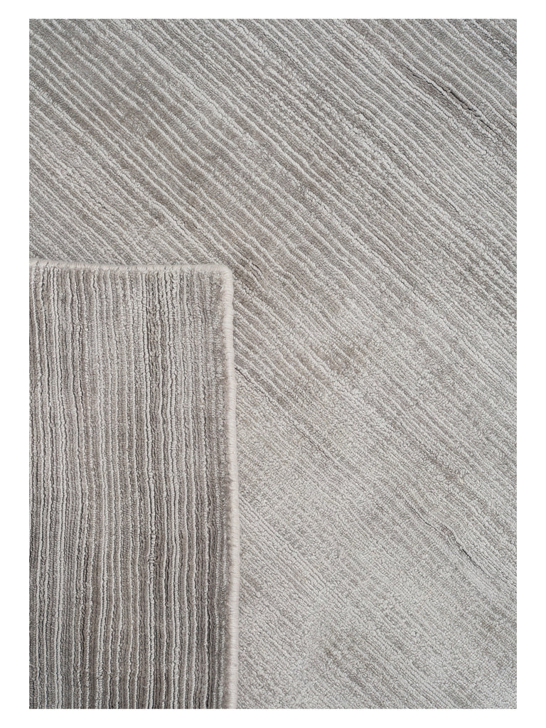 Cover Grey handloom rug – close-up of the texture | Linie Design at Bois Blanc Home, Limassol, Cyprus