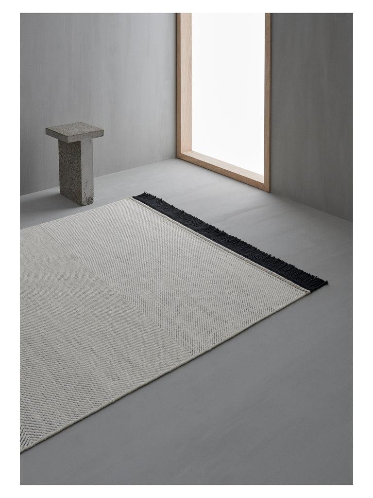 Fenja White hand-woven rug – styled in a living room | Linie Design at Bois Blanc Home, Limassol, Cyprus