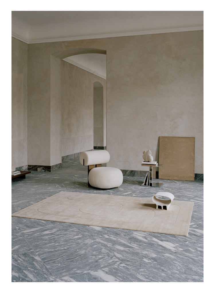 Cursive Expanse Beige loom-knotted rug – styled in a living room | Linie Design at Bois Blanc Home, Limassol, Cyprus