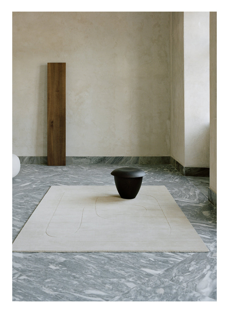 Cursive Expanse Beige loom-knotted rug – styled in a living room | Linie Design at Bois Blanc Home, Limassol, Cyprus
