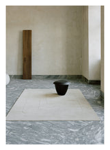 Laden Sie das Bild in den Galerie-Viewer, Cursive Expanse Beige loom-knotted rug – styled in a living room | Linie Design at Bois Blanc Home, Limassol, Cyprus