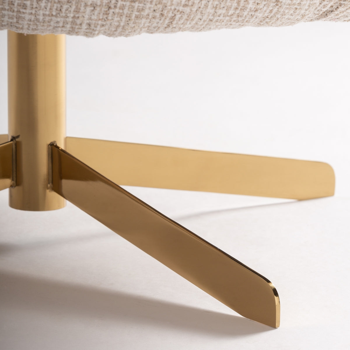 Lounge chair with golden legs