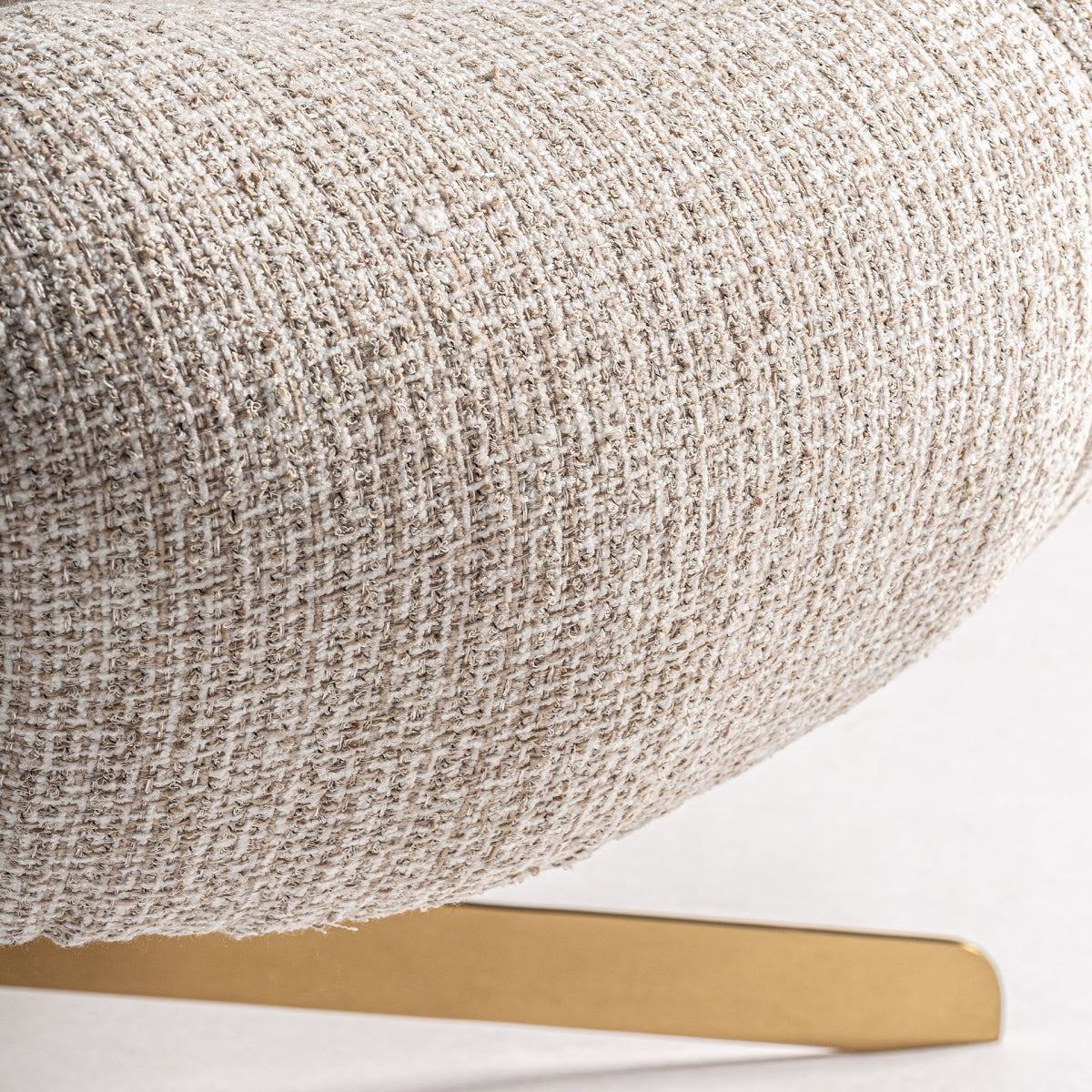 Lounge chair with golden legs