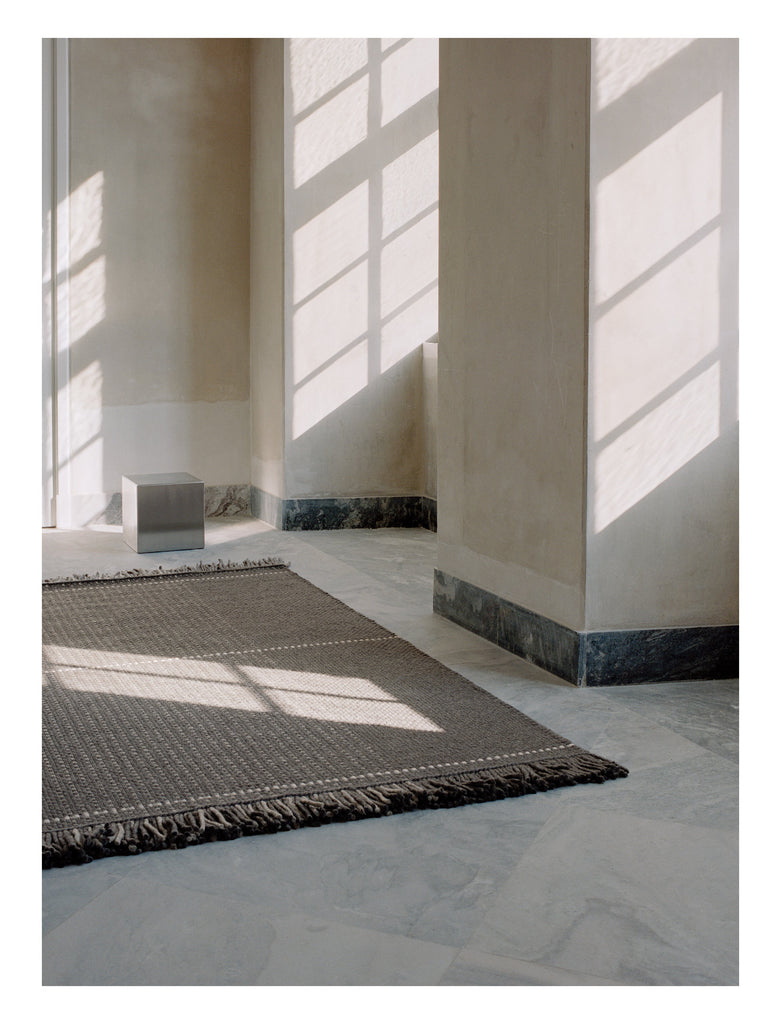 Awakened Mind Charcoal hand-woven rug | Linie Design at Bois Blanc Home, Limassol, Cyprus