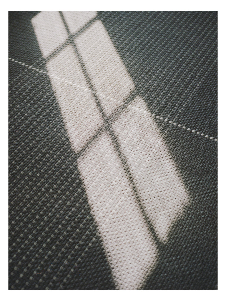 Awakened Mind Charcoal hand-woven rug – close-up of the texture | Linie Design at Bois Blanc Home, Limassol, Cyprus
