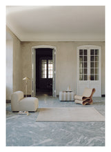 Load image into Gallery viewer, Elemental Verse Beige hand-knotted rug – styled in a living room | Linie Design at Bois Blanc Home, Limassol, Cyprus