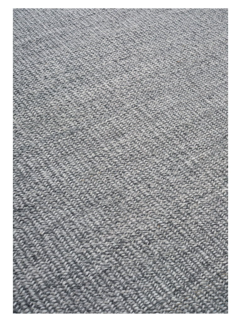 Ash Melange Grey hand-woven rug – close-up of the texture | Linie Design at Bois Blanc Home, Limassol, Cyprus