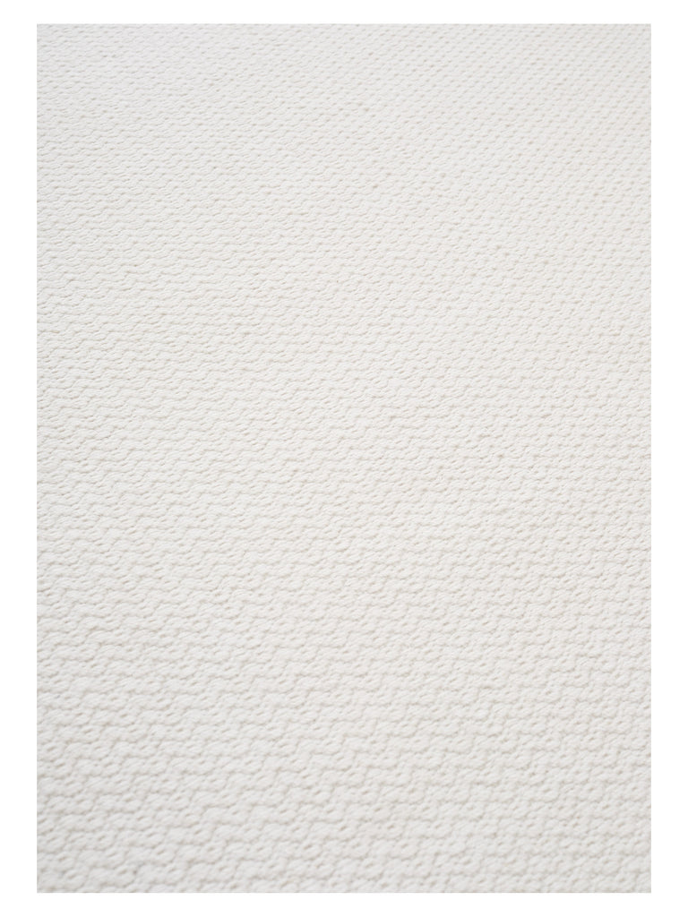 Helix Haven White hand-woven rug – close-up of the texture | Linie Design at Bois Blanc Home, Limassol, Cyprus