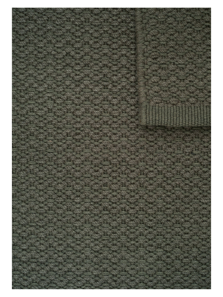 Helix Haven Green hand-woven rug – close-up of the texture | Linie Design at Bois Blanc Home, Limassol, Cyprus