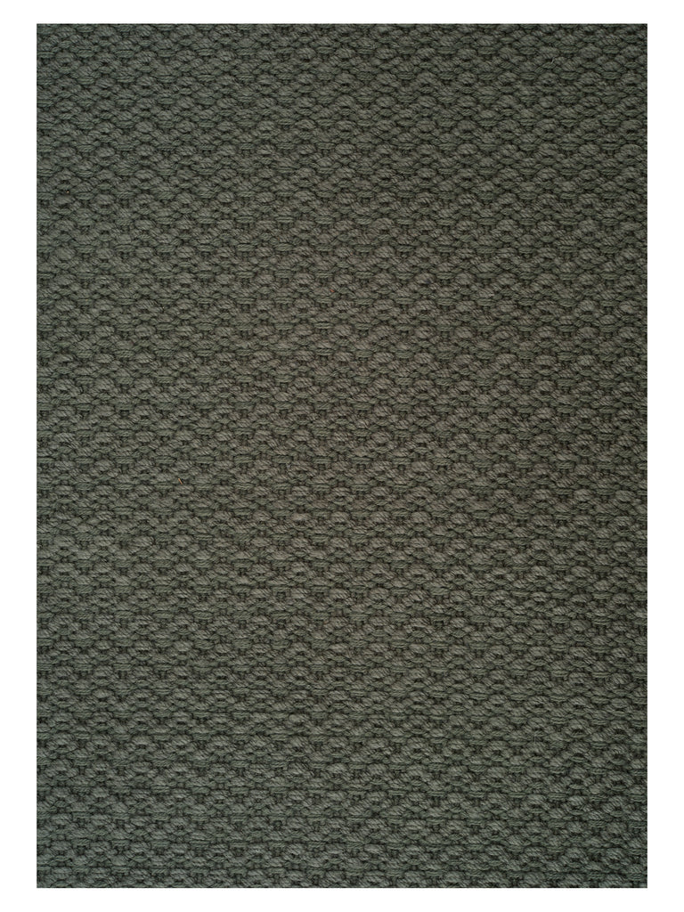 Helix Haven Green hand-woven rug – close-up of the texture | Linie Design at Bois Blanc Home, Limassol, Cyprus