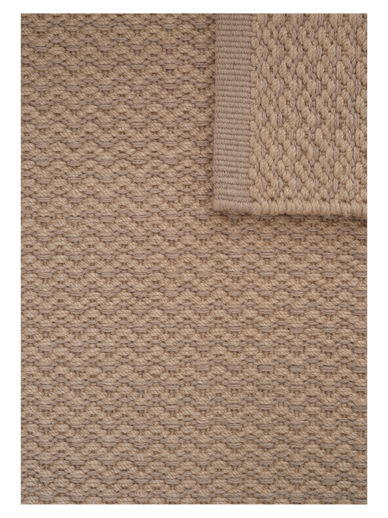 Helix Haven Earth hand-woven rug – close-up of the texture | Linie Design at Bois Blanc Home, Limassol, Cyprus