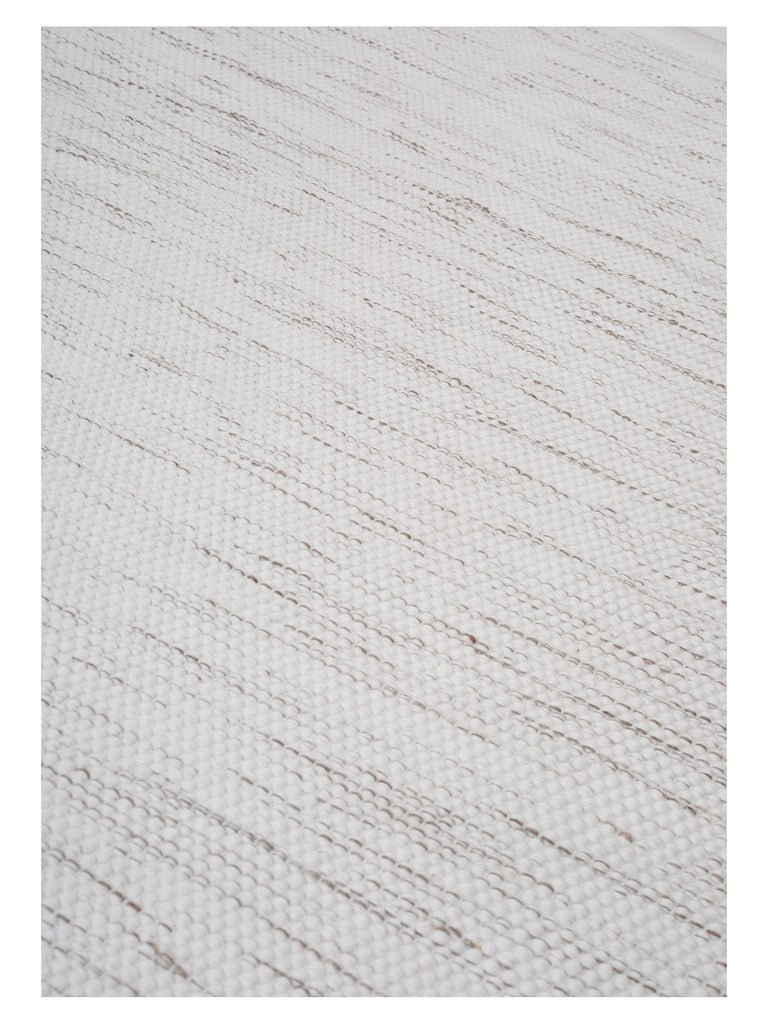 Adonic Mist Offwhite hand-woven rug – close-up of the texture | Linie Design at Bois Blanc Home, Limassol, Cyprus