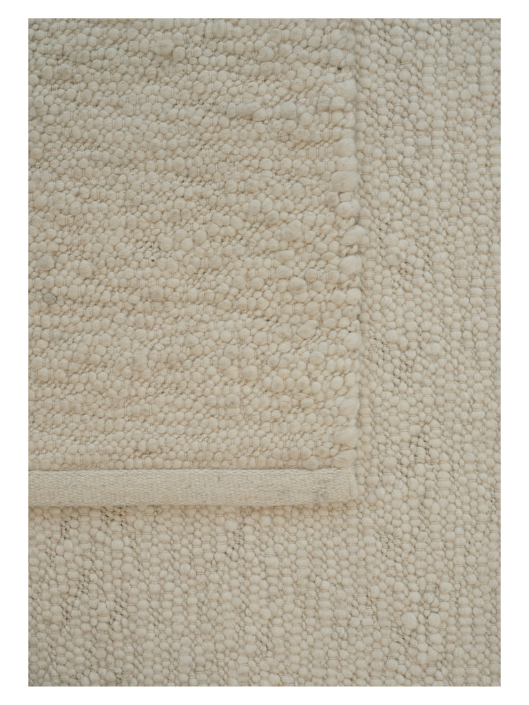 Pebbled Poem White hand-woven rug – detail 4 | Linie Design at Bois Blanc Home, Limassol, Cyprus