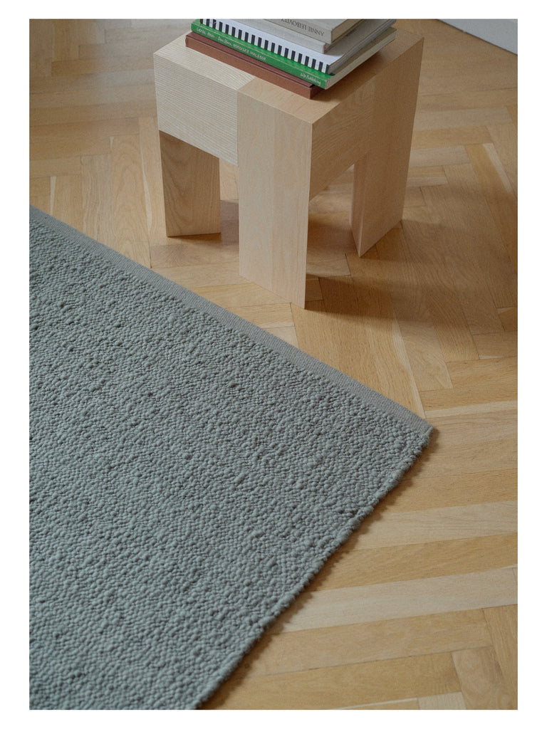 Pebbled Poem Moss hand-woven rug – detail 4 | Linie Design at Bois Blanc Home, Limassol, Cyprus