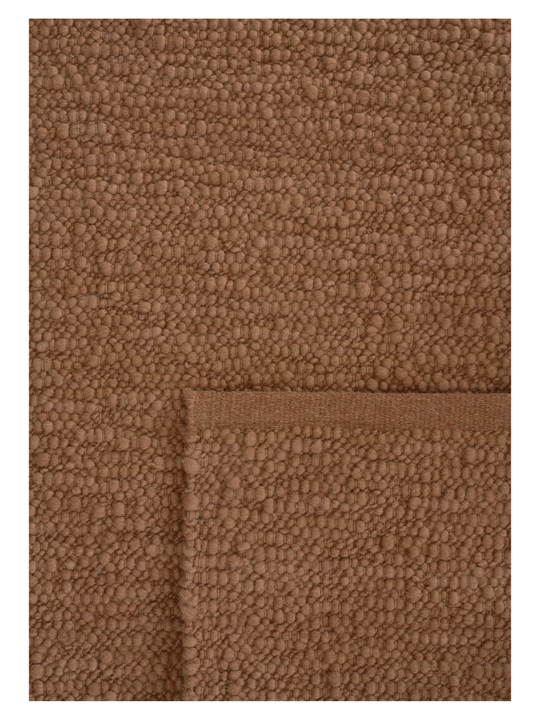 Pebbled Poem Terracotta hand-woven rug – detail 2 | Linie Design at Bois Blanc Home, Limassol, Cyprus