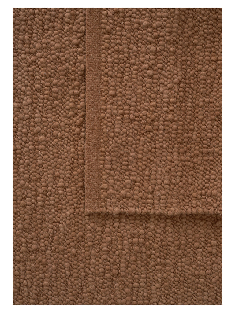 Pebbled Poem Terracotta hand-woven rug – detail 5 | Linie Design at Bois Blanc Home, Limassol, Cyprus