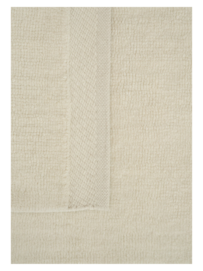 Hushed Frame White table-tuft rug – close-up of the texture | Linie Design at Bois Blanc Home, Limassol, Cyprus