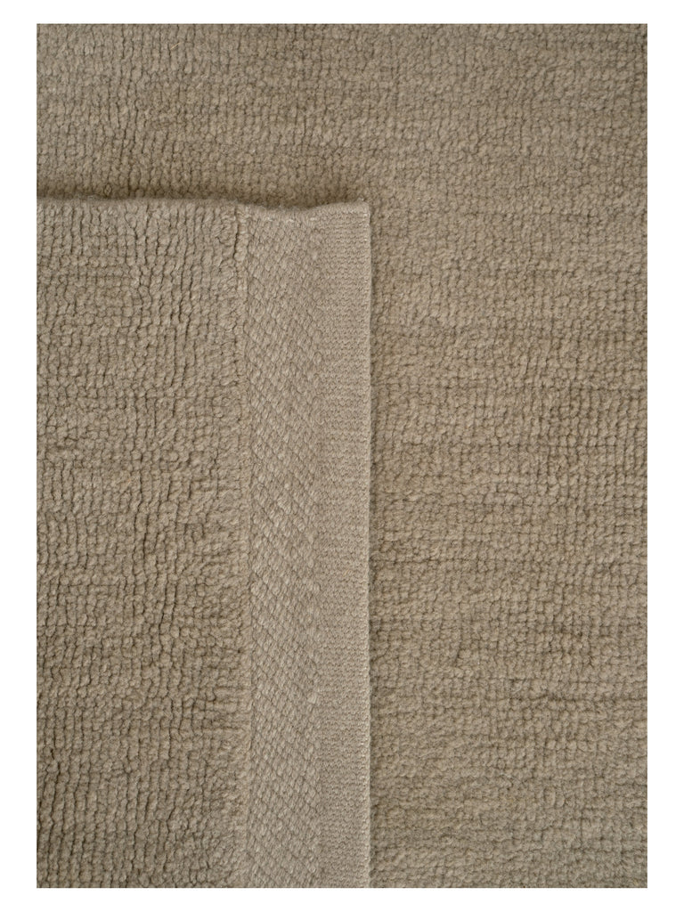 Hushed Frame Earth table-tuft rug – close-up of the texture | Linie Design at Bois Blanc Home, Limassol, Cyprus