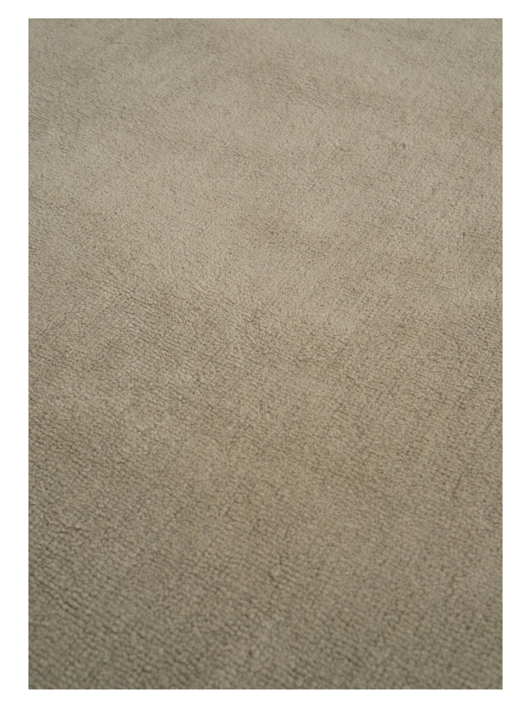 Hushed Frame Earth table-tuft rug – close-up of the texture | Linie Design at Bois Blanc Home, Limassol, Cyprus