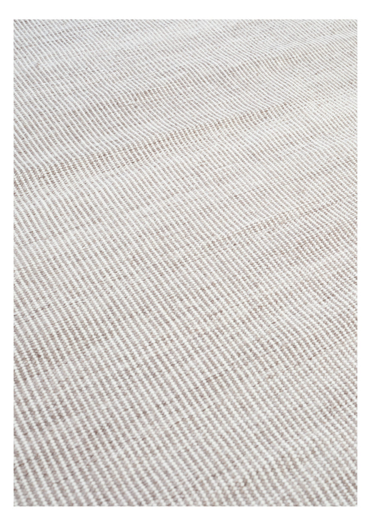 Arbrello Offwhite hand-woven rug – close-up of the texture | Linie Design at Bois Blanc Home, Limassol, Cyprus