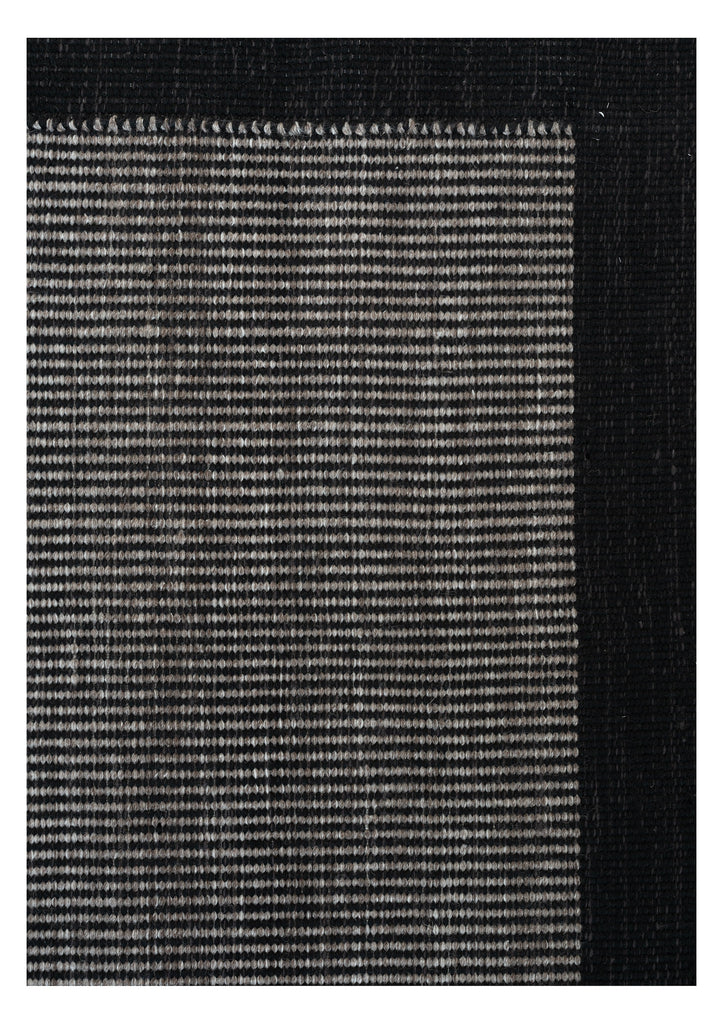 Arbrello Black hand-woven rug – close-up of the texture | Linie Design at Bois Blanc Home, Limassol, Cyprus