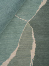 Load image into Gallery viewer, Lucid Trace Green hand-knotted rug – close-up of the texture | Linie Design at Bois Blanc Home, Limassol, Cyprus