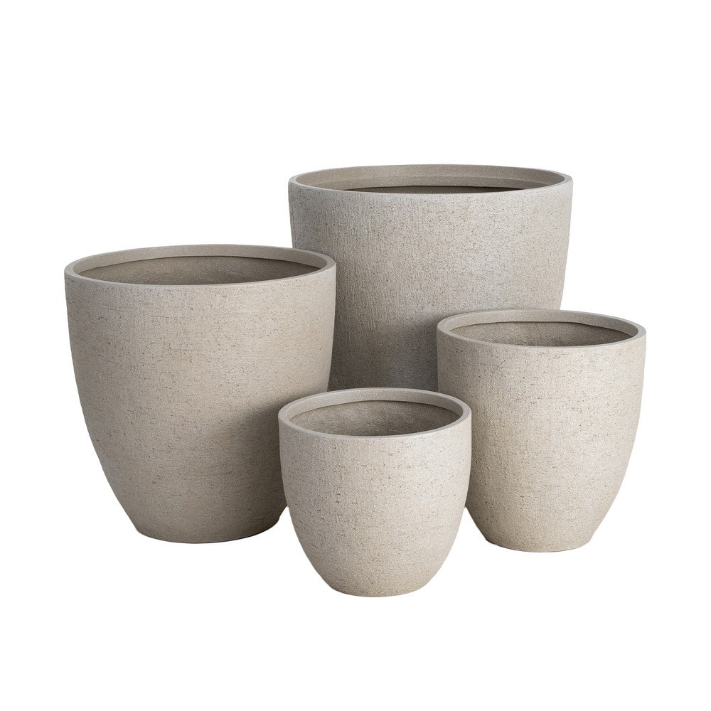 Set of 4 Beige Fibreglass Planters - in setting