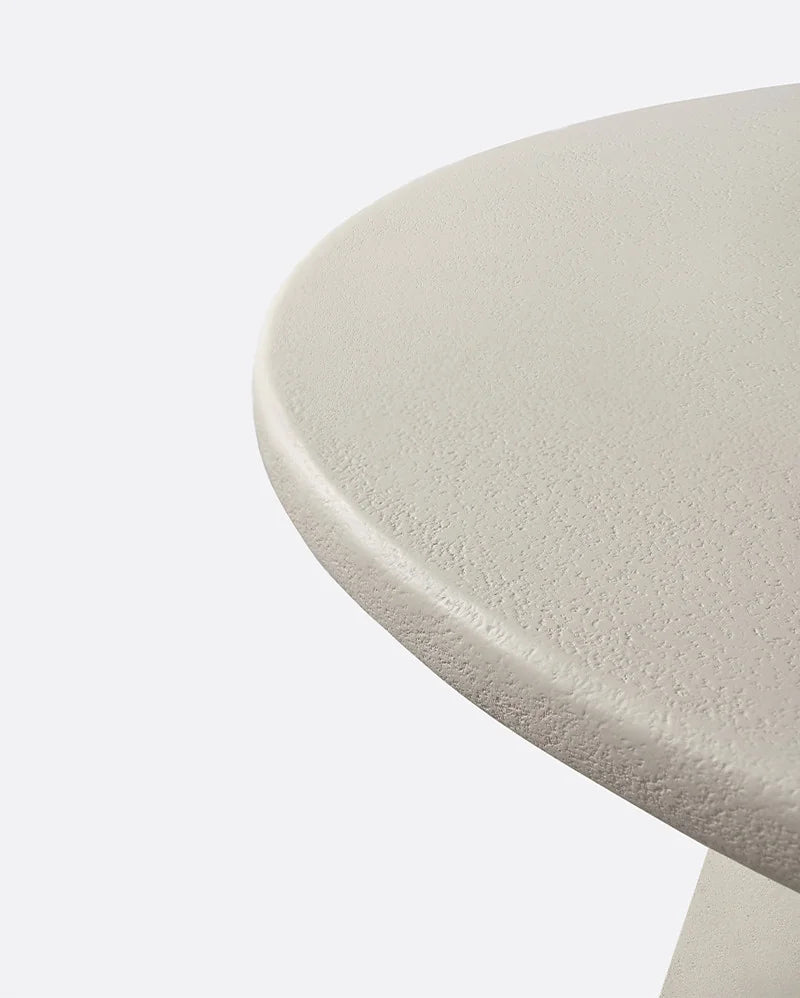 Mesa de comedor de exterior CLAUDE de microcemento Ø 125 cm x 75 cm